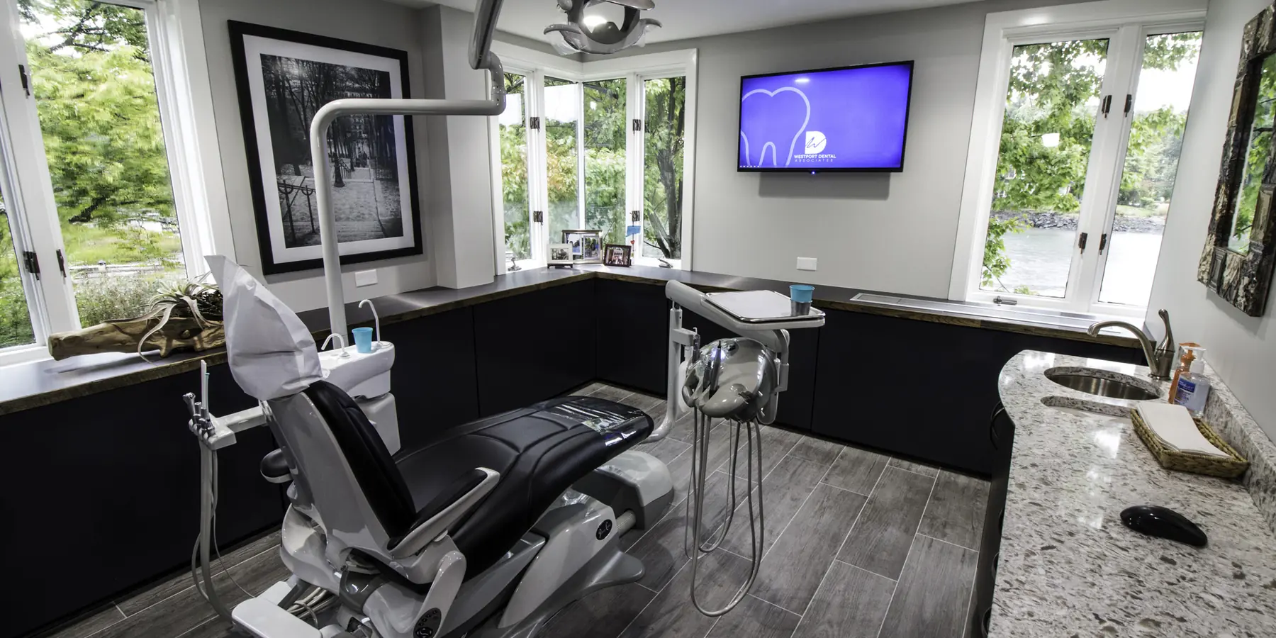 A treatment room at Westport Dental Associates set up for restorative work.